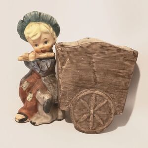 Hummel like planter Boy playing Flute